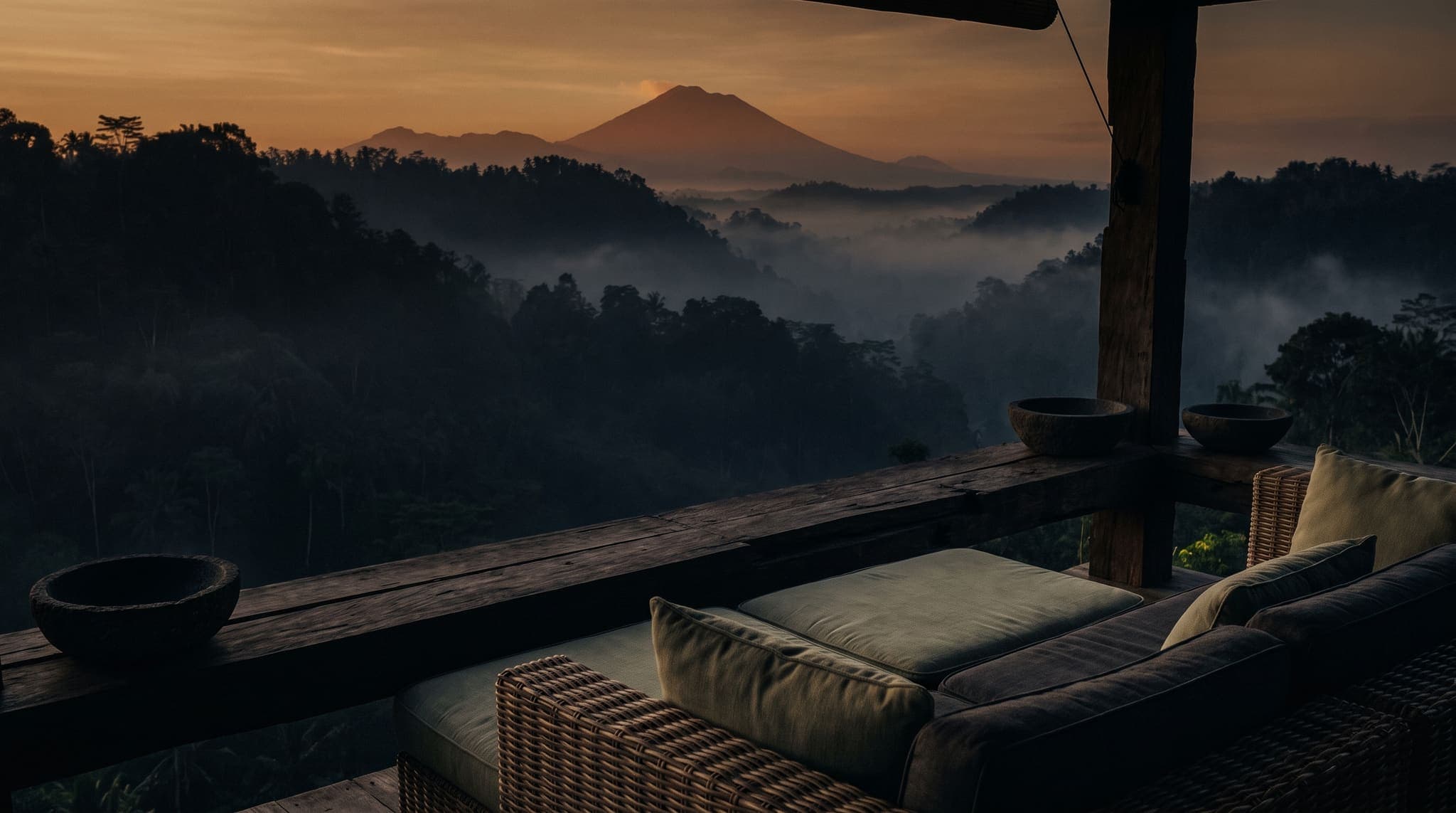 Dawn over the misty valleys and volcano of central Bali